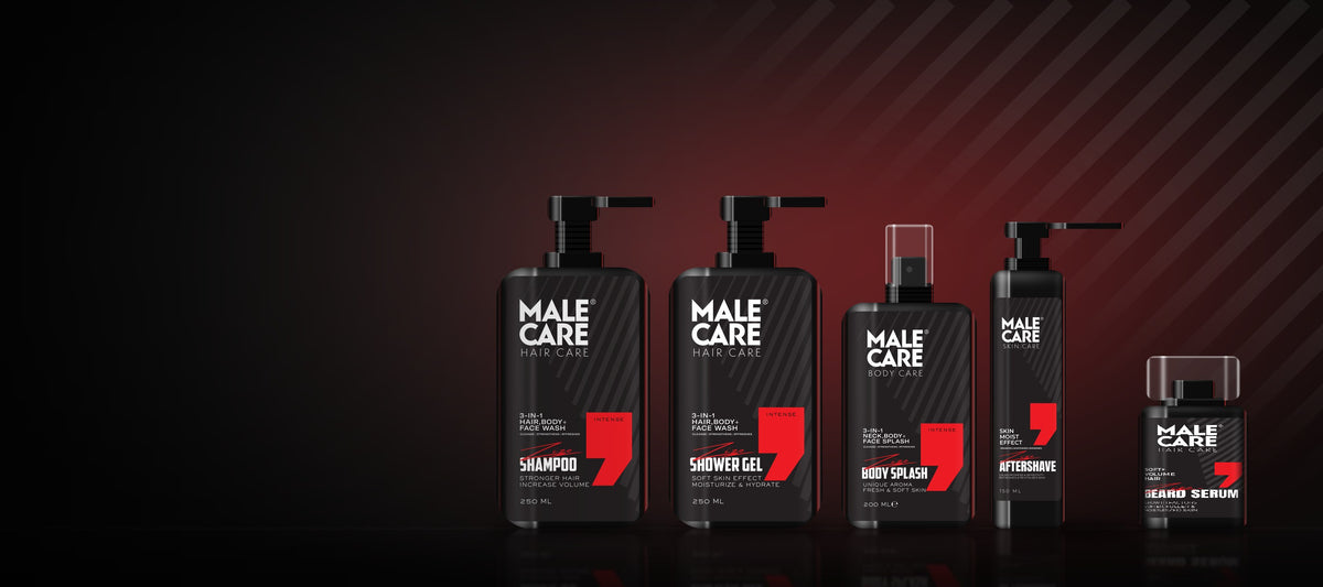 The MALE CARE Signature lineup on a dark wet surface with red light